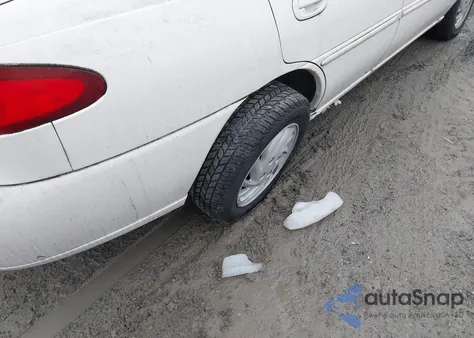 1997 Ford Escort Lx z USA, uszkodzony, nr VIN 1FALP13P6VW409525